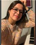 Pianista con más de 20 años de experiencia y musicóloga medievalista investigadora