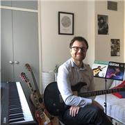 Professional guitar teacher - Fun and affordable lessons tailored to your ability and musical interests!