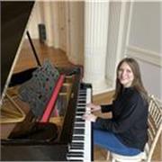 I am a trained piano teacher, beginners onward. 