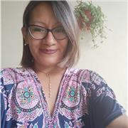 Profesora de primaria imparte clases de comunicación inglés y matemáticas especialmente estudiantes de primer y segundo grado