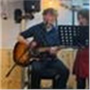 Professional guitar teacher, 13 years experience. Guitar lessons or song writing lessons. First 3 lessons are free!