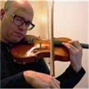 Professor de violín para personas de nivel principiante, y personas con discapacidad para terapia con el instrumento 