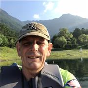 I am a native English speaker and have 20 years of experience in teaching English to foreign students