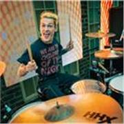 Drum tutor teaches students of all ages
