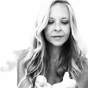 An artist and intuitive Tarot reader with 30 years of experience and practical application.