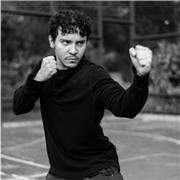 Entrenador especializado en la triple disciplina de Wushu, Sanda y Boxeo