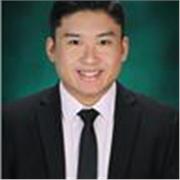Maths tutor assisting students and delivering results to children