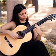 Profesora de guitarra da clases de refuerzo de conservatorio, iniciación, acordes, lenguaje musical y armonía