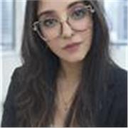 Patient tutor helping students find confidence in English.