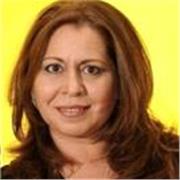 Profesora de inglés para adultos abarcando tanto inglés general como inglés de negocios o por viajes