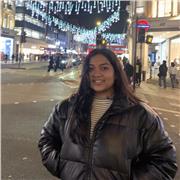 Friendly and Supportive Tutor Helping Students Build Confidence and Achieve Success