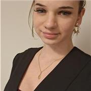 Teen tutor helping other teens and kids with flute lessons