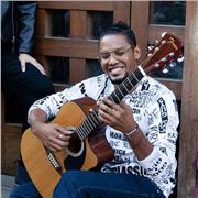 Profesor de guitarra dicta clases nivel basico