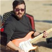 Insegnante di chitarra, solfeggio e teoria musicale
