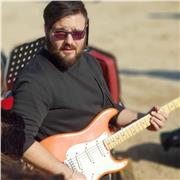 Insegnante di chitarra, solfeggio e teoria musicale