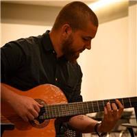 I teach guitar and music theory aimed at beginner level students.