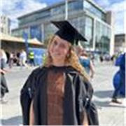 Supportive and approachable tutor creating calm, confidence-building learning environments