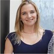 Confident, empathetic coach supporting student wellbeing and growth