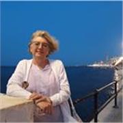 an experienced Teacher of General and Academic English