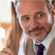 A worldly experienced interactive talker A person who listens and delivers what the client requires to develop their English