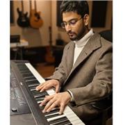 Trinity-certified piano director offering premium, studio-quality online lessons for beginners and intermediate students.
