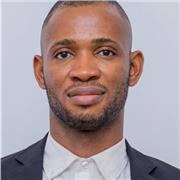 Are you really interested in building softwares as a beginner I can help you take the very first step and help you see programming as something interesting and fun. 
I have been exposed to quite a number of programming languages namely Java, python, javas