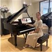 Profesora de musica, canto . Instructora de piano