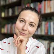 Holistic integrative therapist. Warm, supportive, guiding, calming, confident