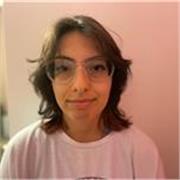 Bilingual student helping children in their future studies 