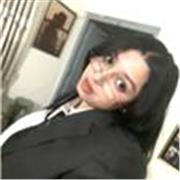 Patient, adaptable tutor helping non-native speakers improve English skills effectively.