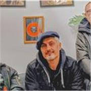 Performing guitarist teaching beginners and intermediate rock, blues