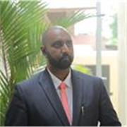 Graduate law lecturer teaching undergraduate students all ages