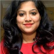 Maths tutor providing lessons to primary school students