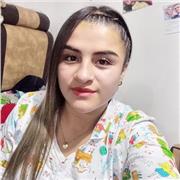 Auxiliar de apoyo para dictar clases en el aula con la docente