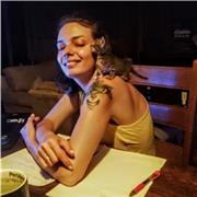 Passionate French teacher guiding learners online to improve language skills confidently