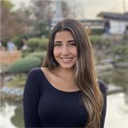 Estudiante universitaria, Lista para ayudarte a comenzar con el Español