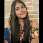 Profesora de apoyo escolar en la materia de matemáticas para niños de primaria