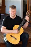 Guitar tutor gives online lessons for all ages