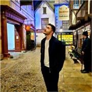 Patient software engineer helping students master coding and confidence