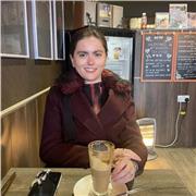 Friendly and patient tutor helping students understand difficult topics easily.