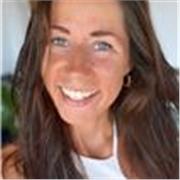 Supportive coach empowering young people to grow confidently. 