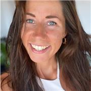 Supportive coach empowering young people to grow confidently.