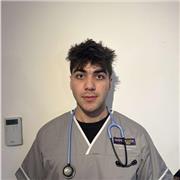 A* Medical student teaching all levels of biology