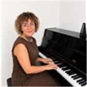 Profesora de piano para iniciación en adultos. Diferentes metodologías adaptadas a las necesidades, gustos y tiempo del alumno/a