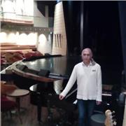 music teacher, gives private piano lessons, and music theory