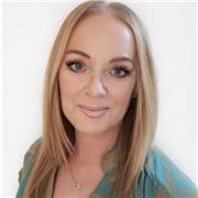 Supportive online tutor helping students improve confidence, communication skills, and clear spoken English.