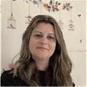Maths tutor providing lessons to children in primary school