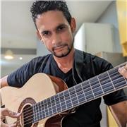 Clases de guitarra a domicilio para principiantes....niños ,jóvenes y adultos
