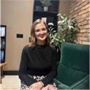 Friendly student coach helping young people build confidence, motivation, balance, organisation, and positive study habits. 