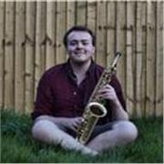 Guitar and Saxophone tutor giving online music lessons.